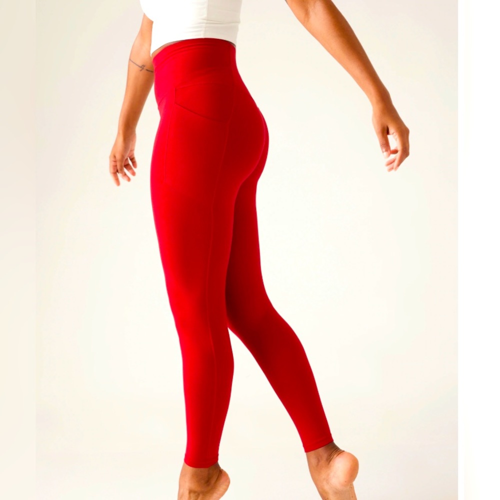 Athleta Salutation Stash Tight - women’s medium (tall) in red